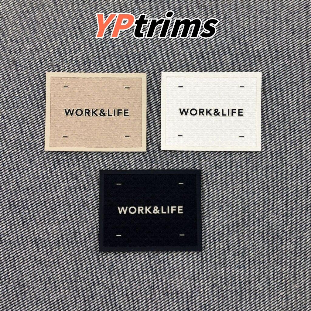 wholesale minimalist square pu leather label with embossed silicone font – backpack & clothing supplier