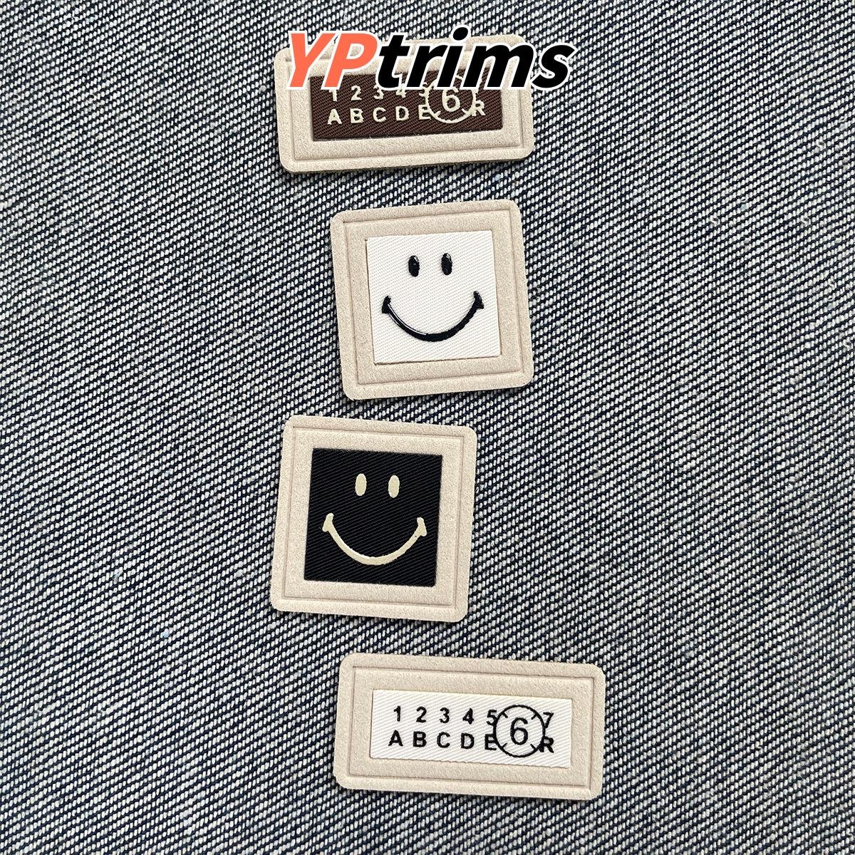 custom square smiley face patches – sew-on pu labels for hats, shoes & menswear factory