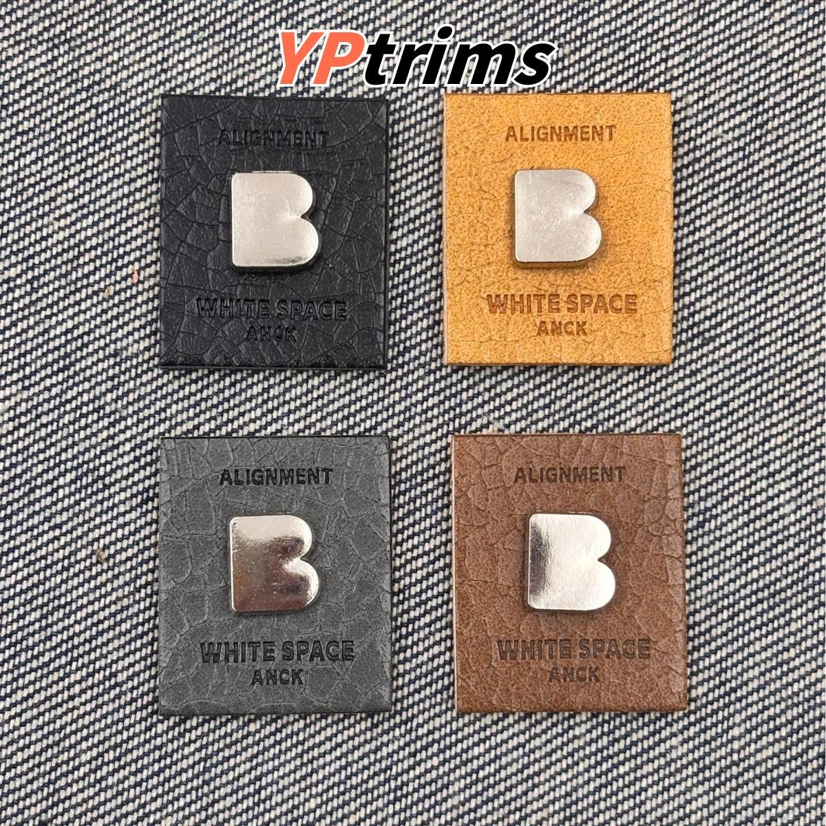 custom double-layer leather patch with double rivets | sew-on clothing label for hats, shoes & menswear supplier