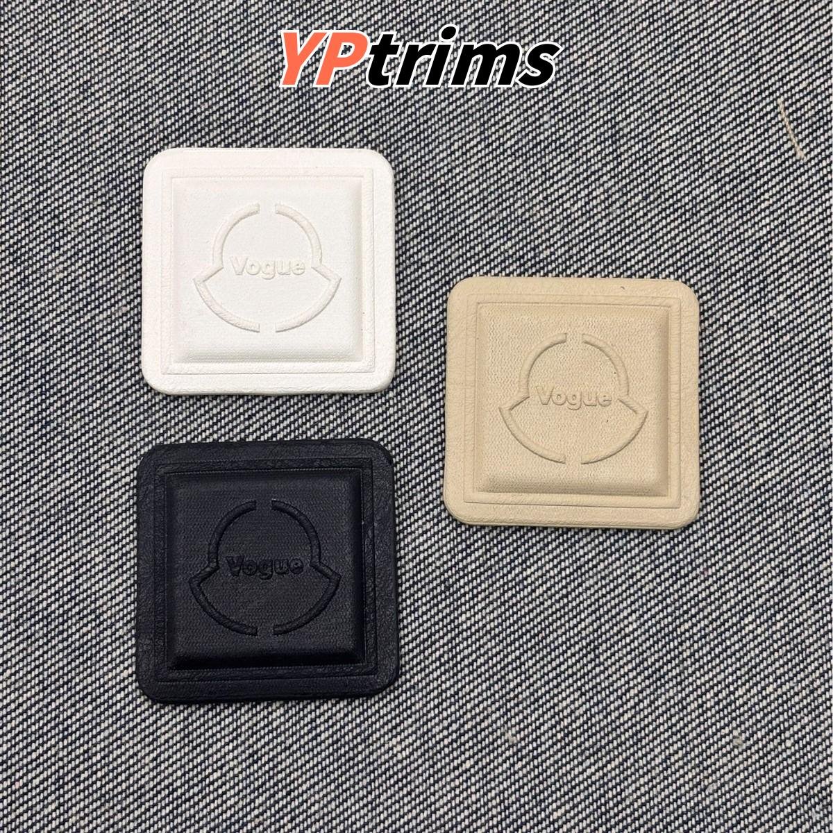 wholesale minimalist style pure color embossed leather labels for menswear & backpacks | supplier
