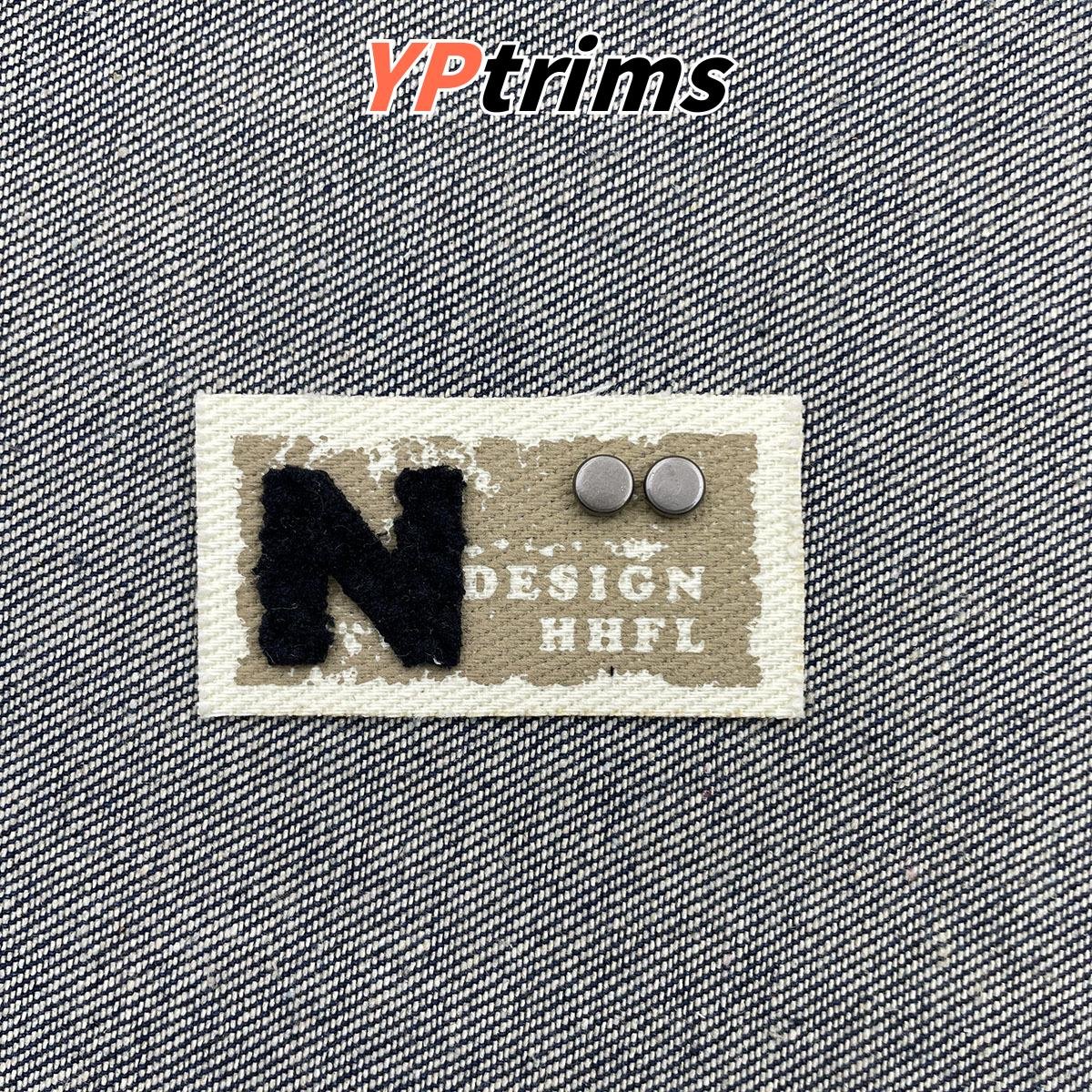 custom vintage washed leather patch with letter n – jeans clothing label factory