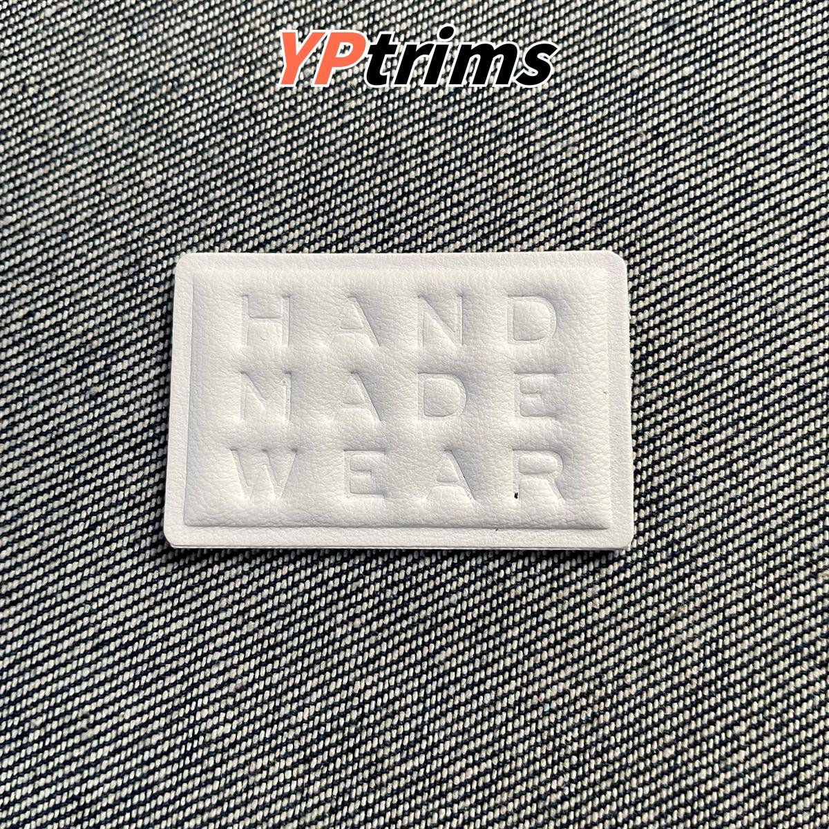 custom embossed handmade leather patch – sew-on label for hats, shoes & streetwear factory