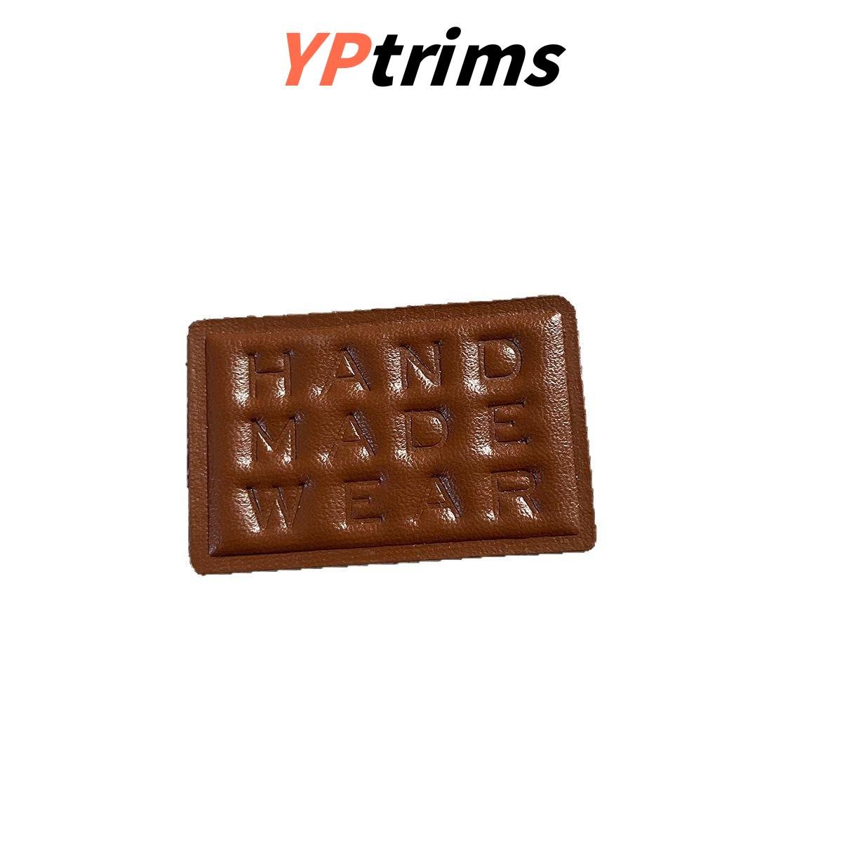 custom embossed handmade leather patch – sew-on label for hats, shoes & streetwear factory