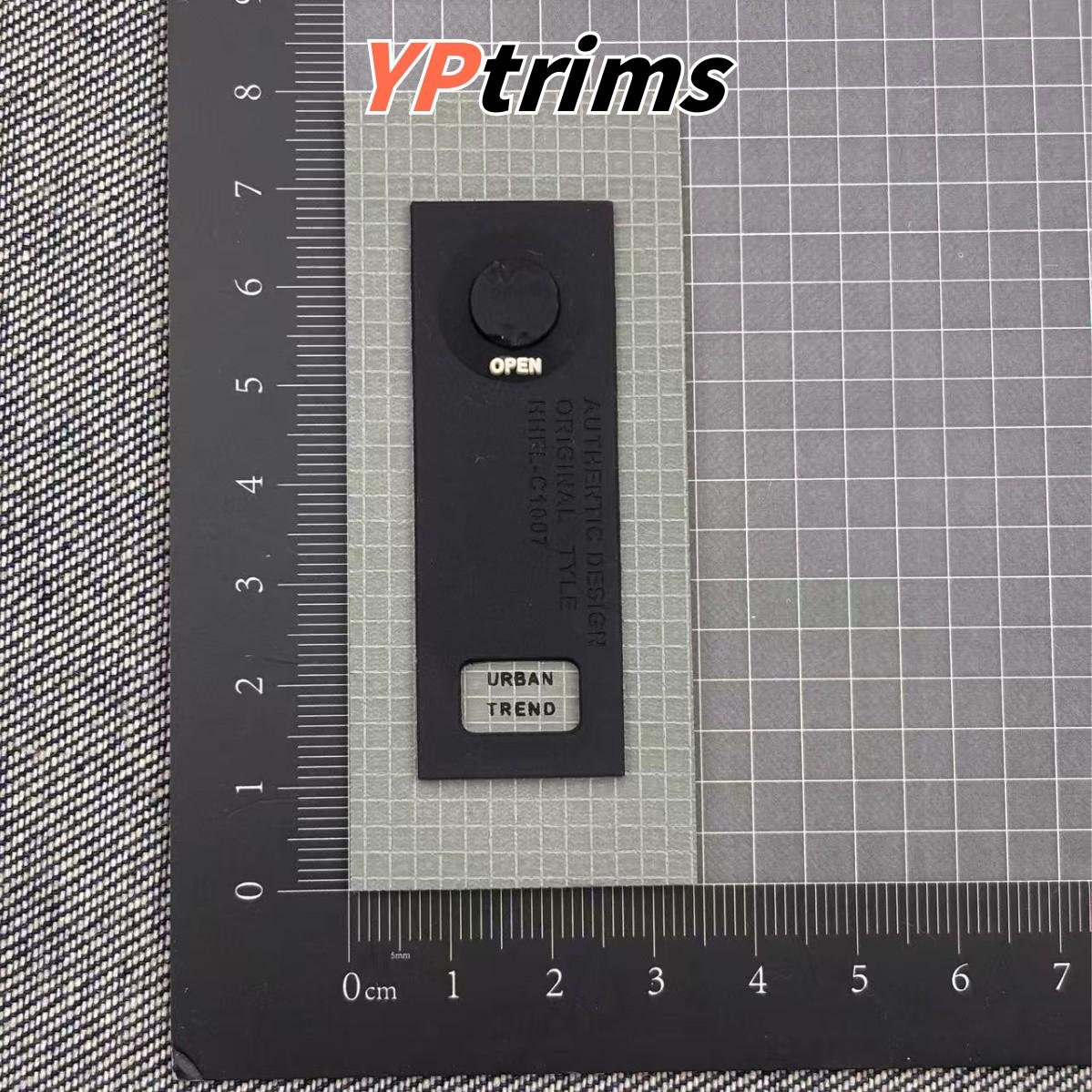 custom pvc silicone jeans patch – letter m triangle metal leather label for denim waistband factory