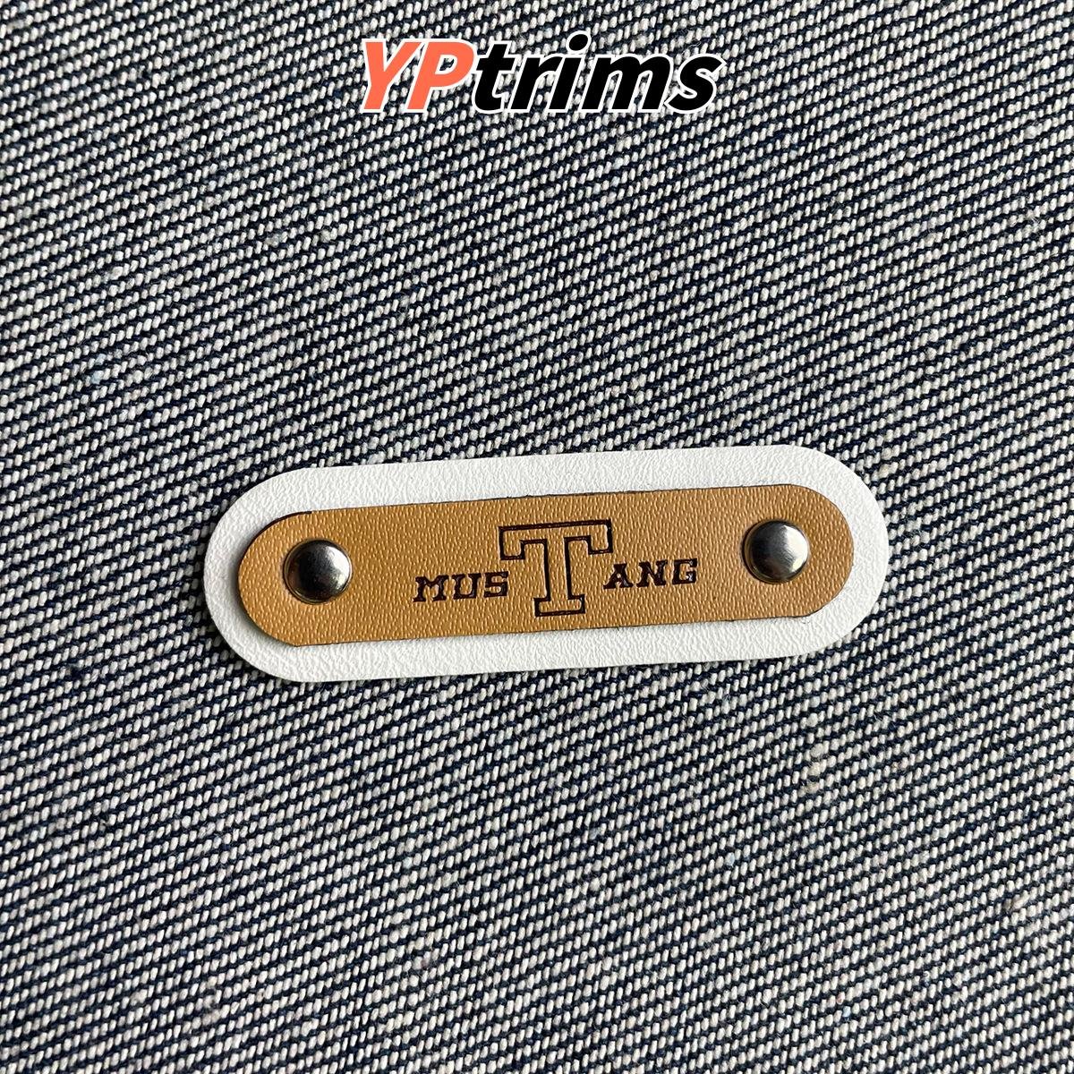 wholesale riveted leather badge in layered design for menswear & streetwear | fashion trim supplier