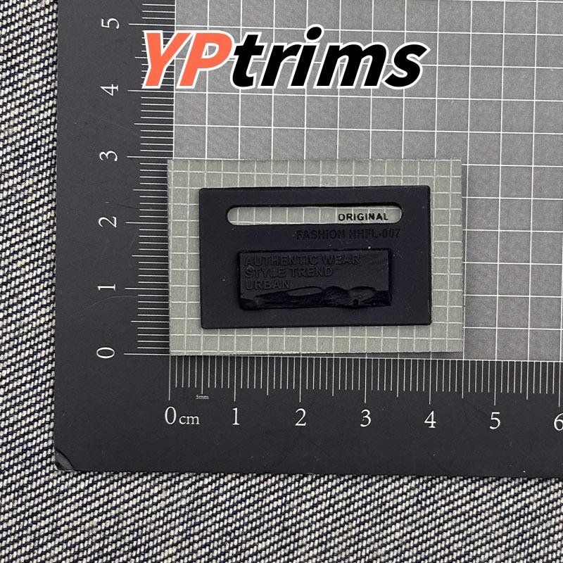 custom pvc silicone jeans patch – letter m triangle metal leather label for denim waistband factory