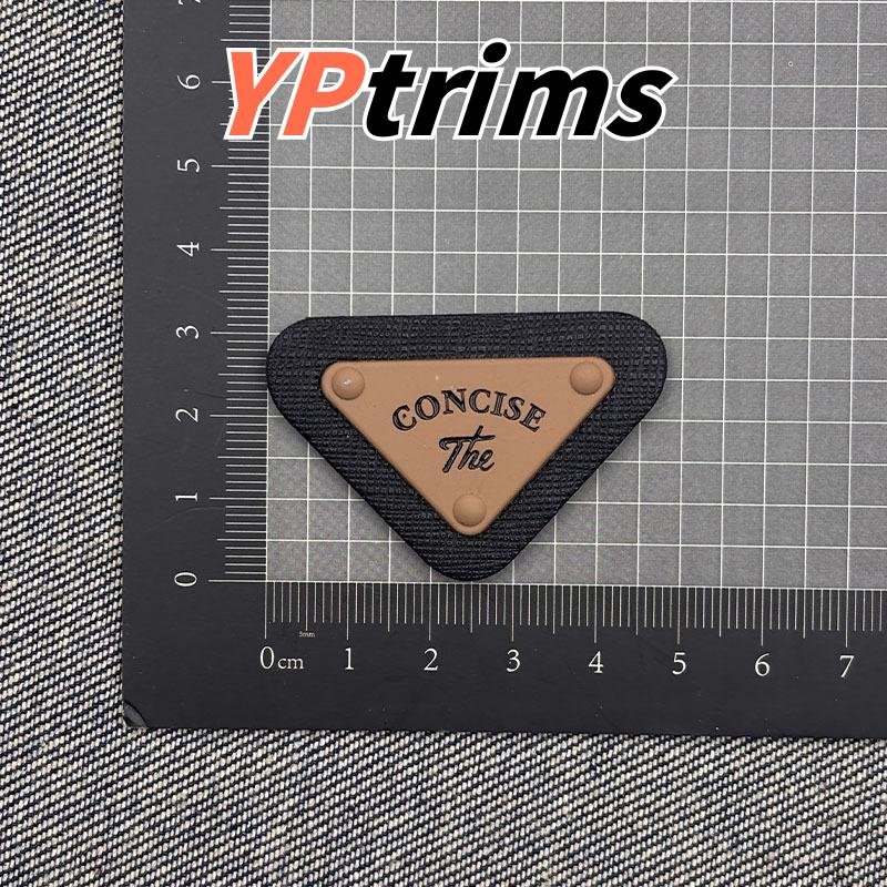 custom pvc silicone jeans patch – letter m triangle metal leather label for denim waistband factory