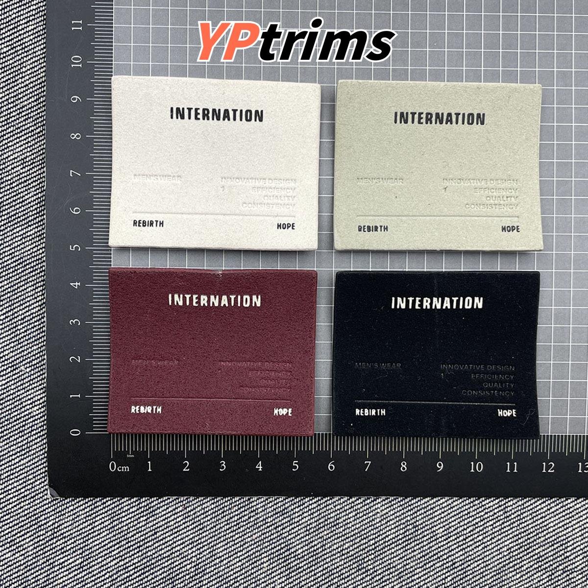 custom matte leather rectangle patch with english design for shirts & backpacks | supplier