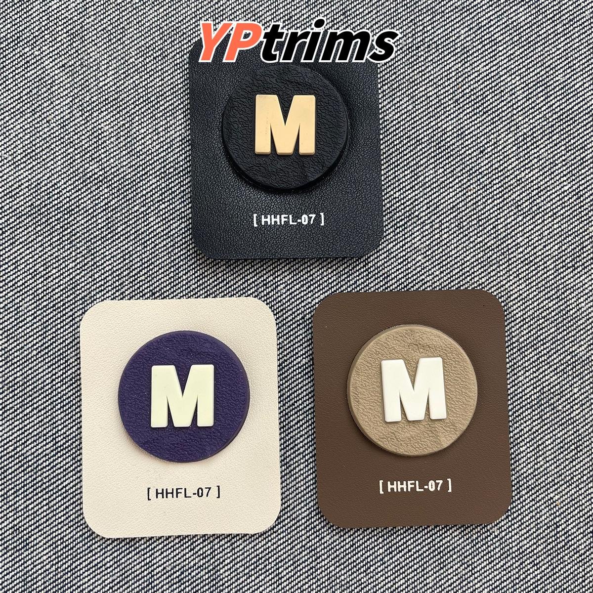 custom pvc drip m letter logo patch – combination silicone label for hats & streetwear factory