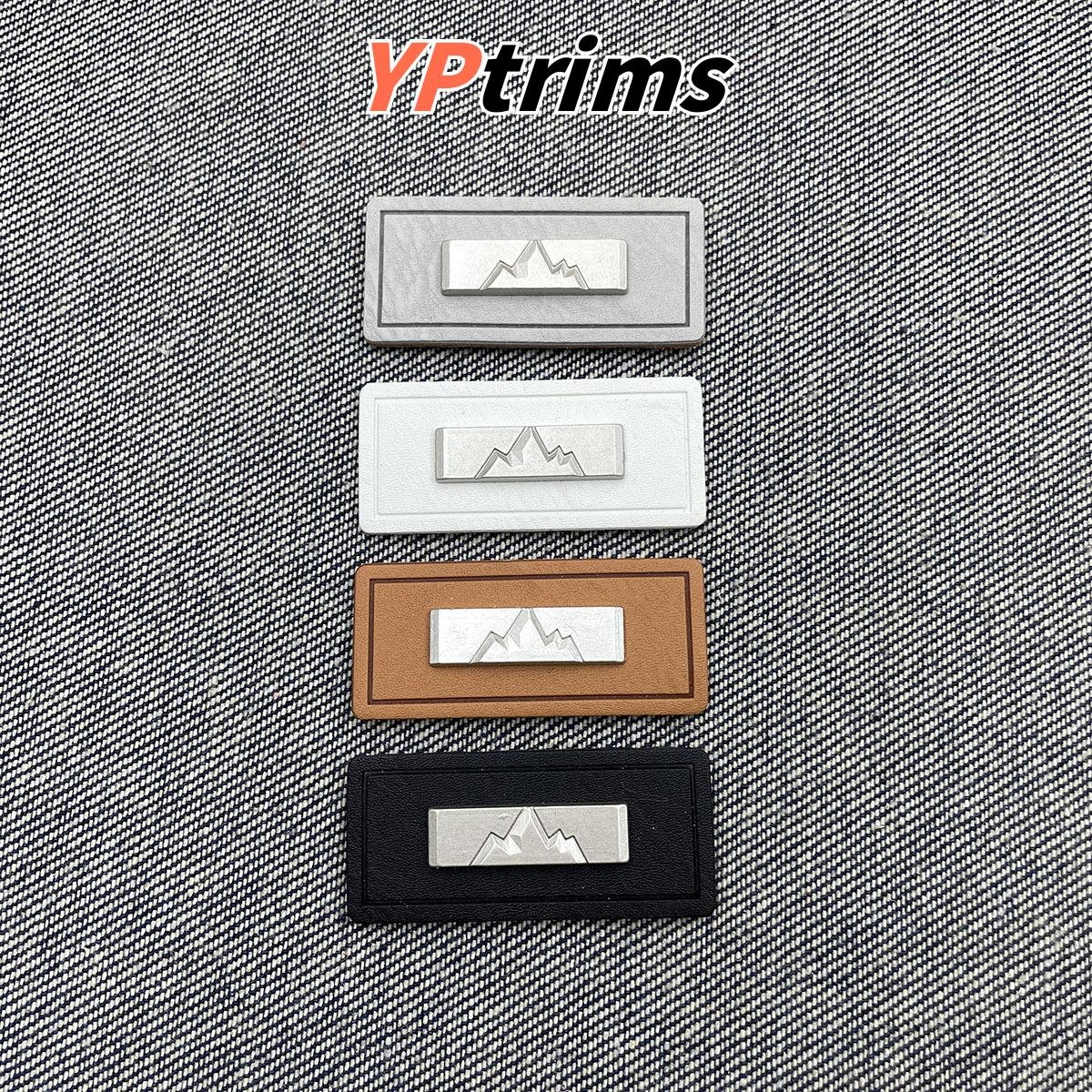 wholesale mountain pattern leather tag with metal decoration – outdoor fashion garment label | supplier