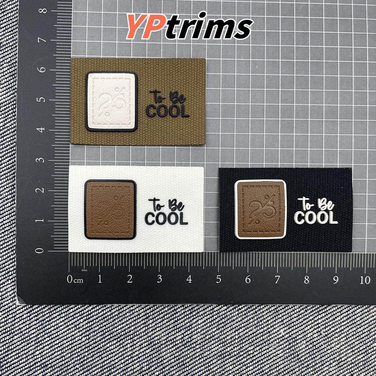 custom rectangular fabric base leather combo label for trendy boy tops, pants, and pet backpacks - youth decor factory