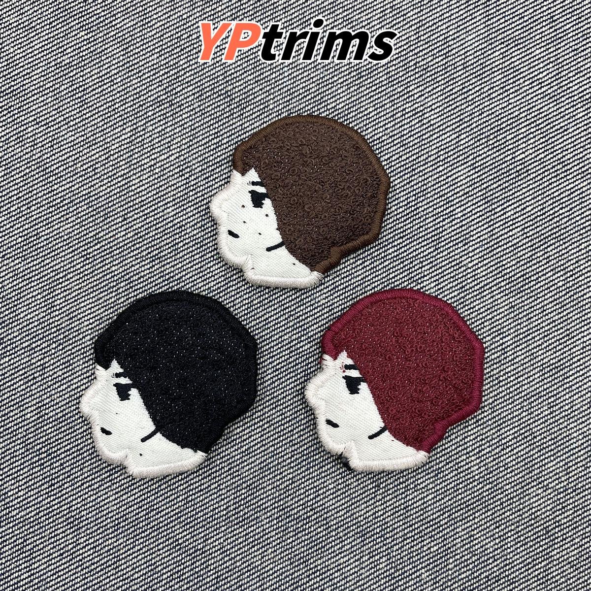 custom cartoon side-face little figure filled embroidery label for trendy men's clothing