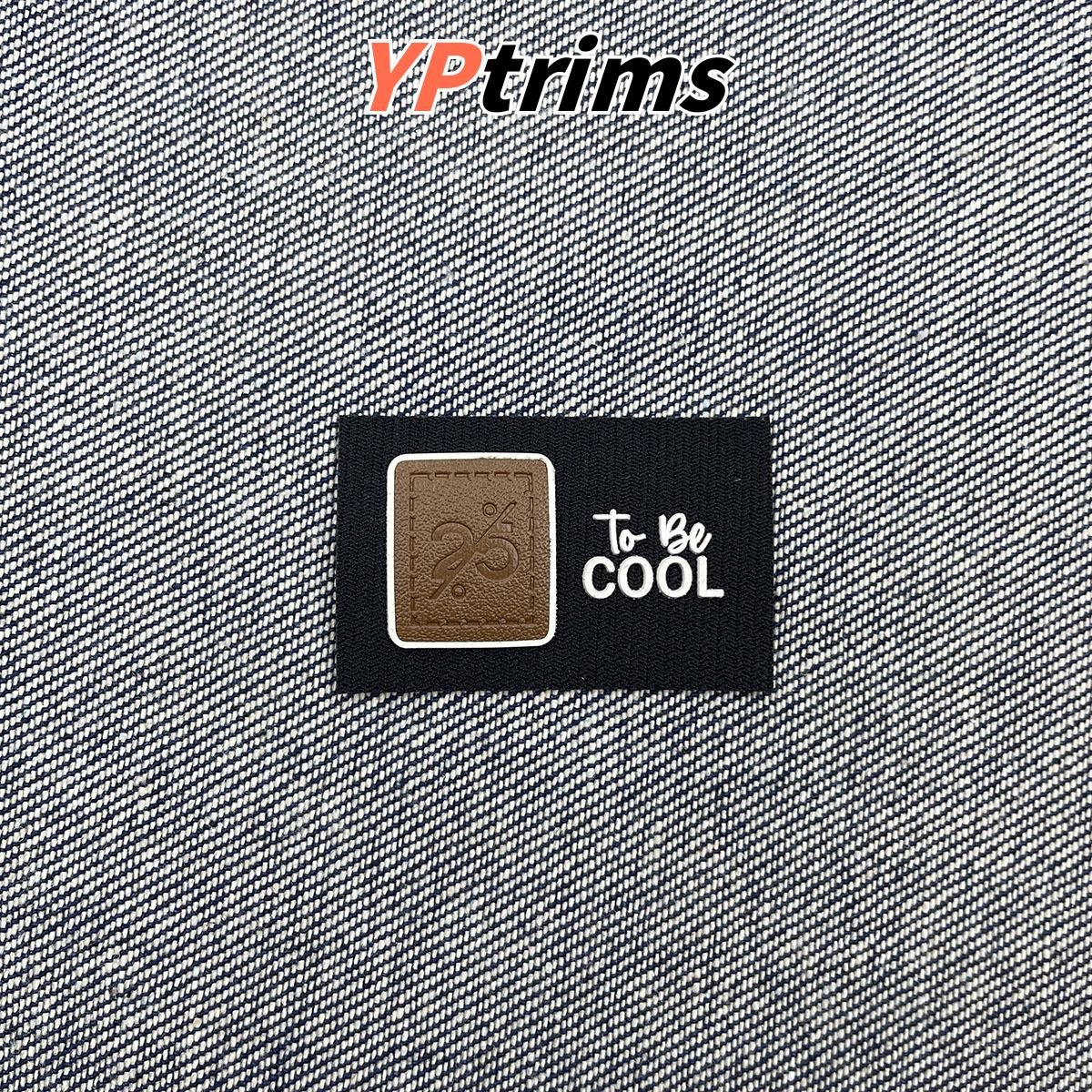 custom rectangular fabric base leather combo label for trendy boy tops, pants, and pet backpacks - youth decor factory