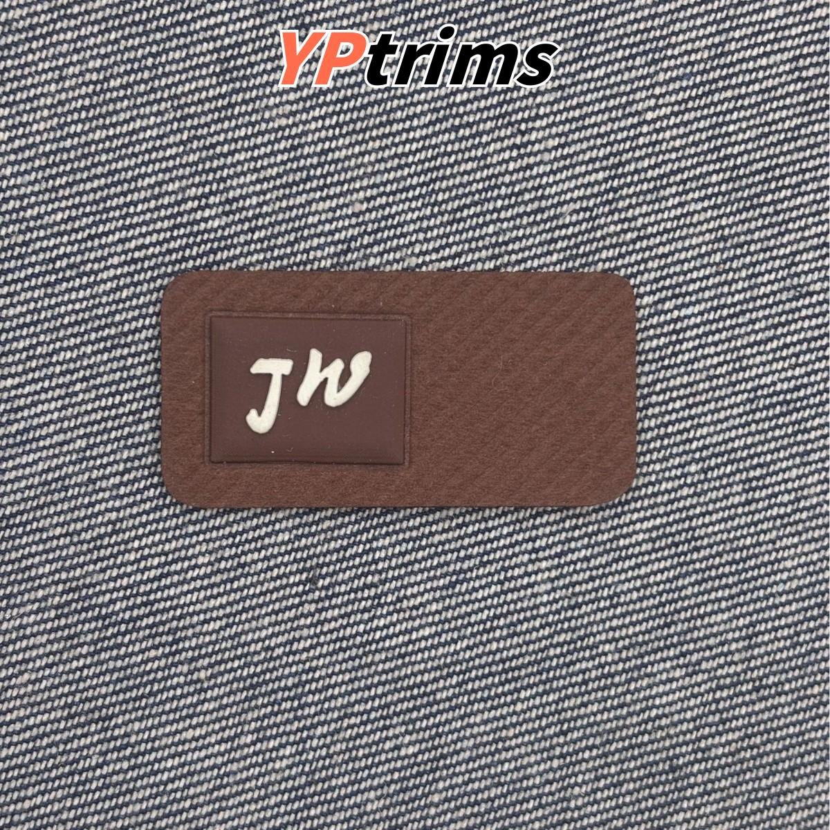 custom embossed twill pressed decorative leather letter label for trendy men's clothing and pants