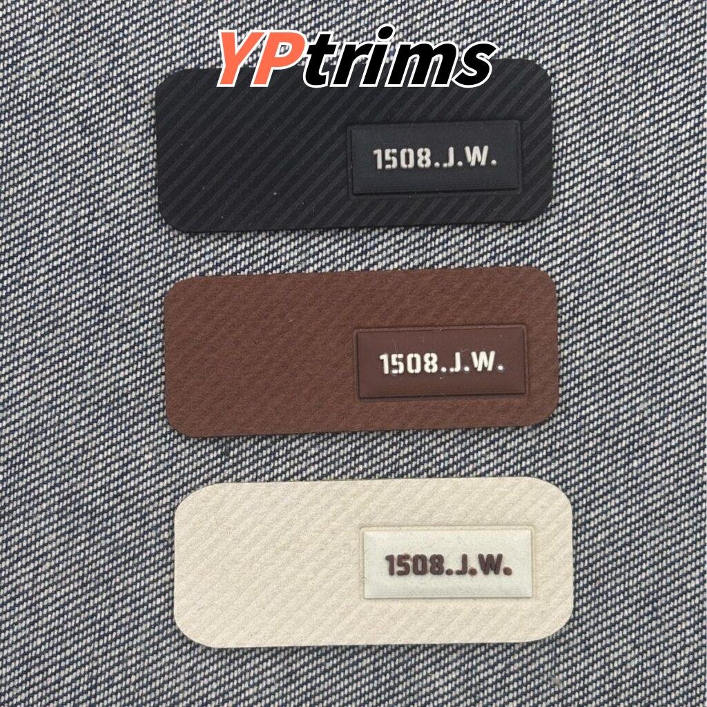 custom embossed twill pressed decorative leather letter label for trendy men's clothing pants