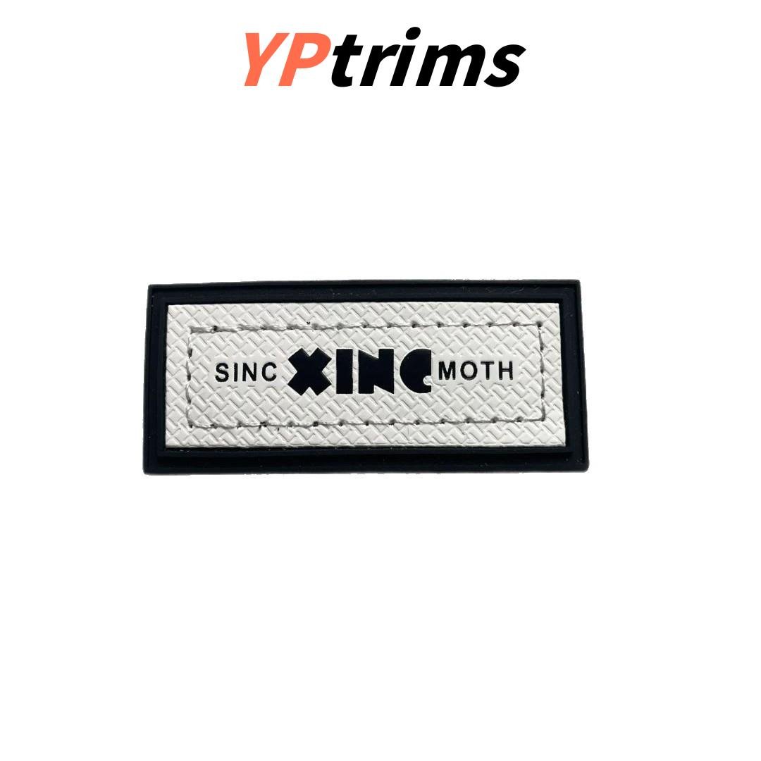 custom rectangular pvc little bear pattern sewn combination leather label for trendy pet and kids' clothing